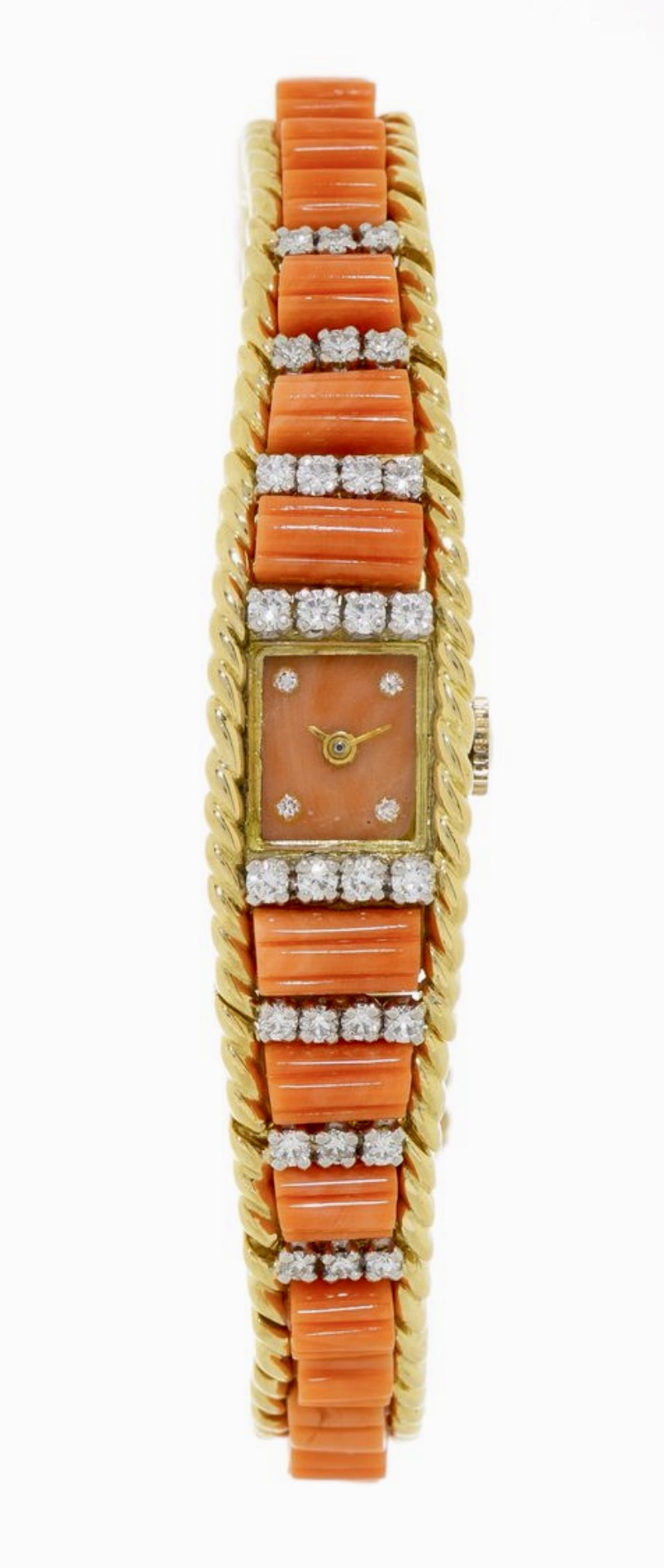 Armbanduhr aus 750er Gold mit Zifferblatt und Armband verziert mit Diamanten und Korallen. Uhrwerk: mechanisch, 17 Steine. Gehäuse: Nr. 11651, Breite 14.    12'200.--