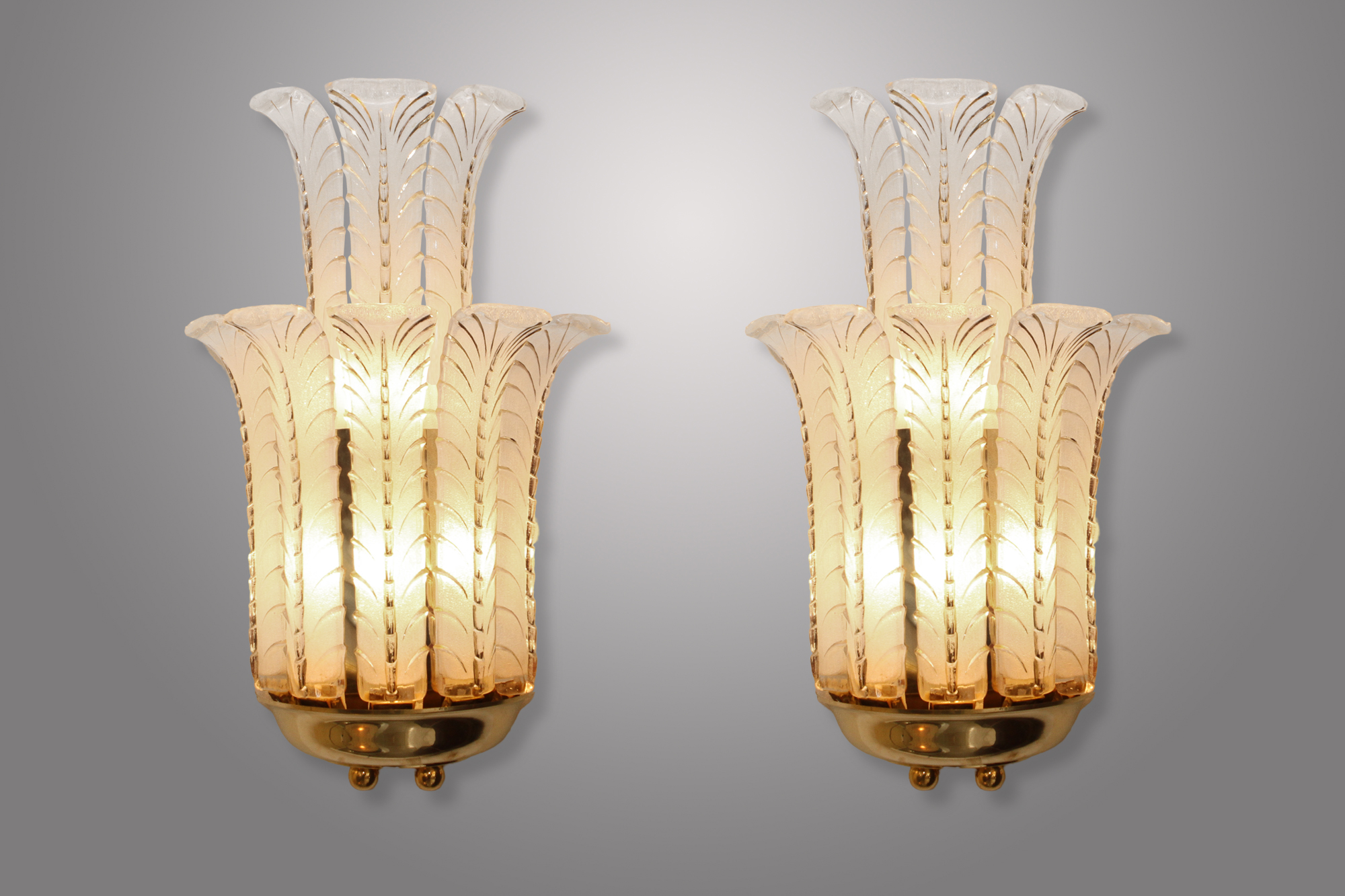 Sconces ‘‘EZAN’’ - 1930 Pair of double-tier sconces - Gilded metal.